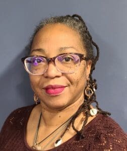 A woman wearing glasses headshot